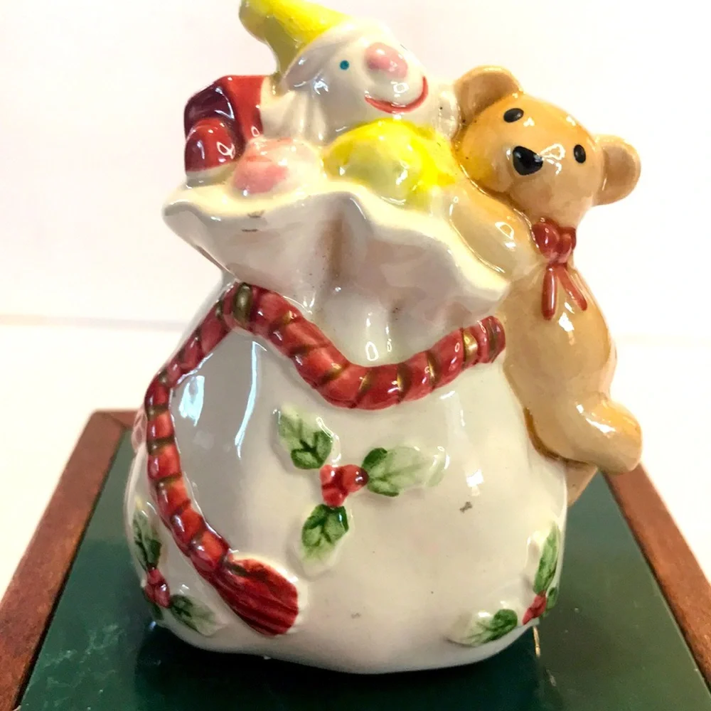 Vintage Fitz and Floyd ceramic Christmas shaker decor.